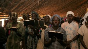 Singing. Church service in Yei, South Sudan.